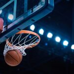 Basketball,scoring,a,basket,as,it,goes,through,the,hoop