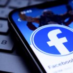 The,Facebook,Logo,Appears,On,The,Phone,Screen.,Facebook,Was