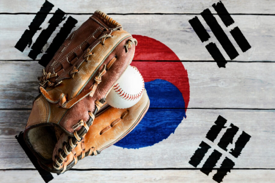 Leather,Baseball,Glove,With,Ball,On,Rustic,Wooden,Background,With